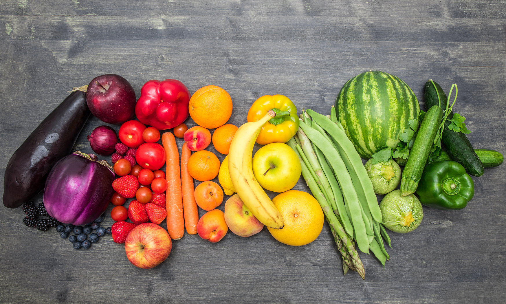 Assortment of fresh vegetables arranged in a rainbow of colors.