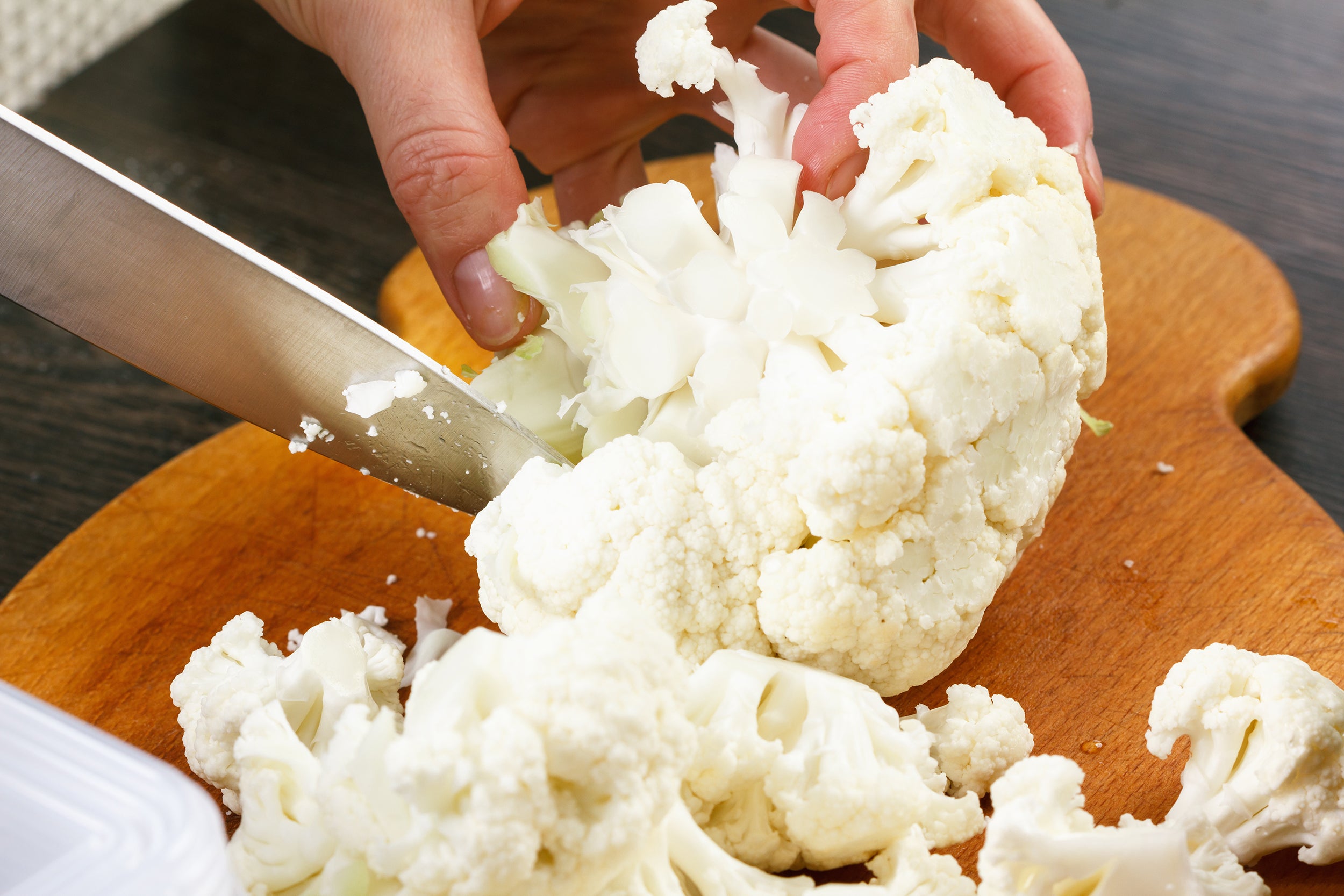 Cutting up cauliflower used in Kekoa Foods organic baby foods.