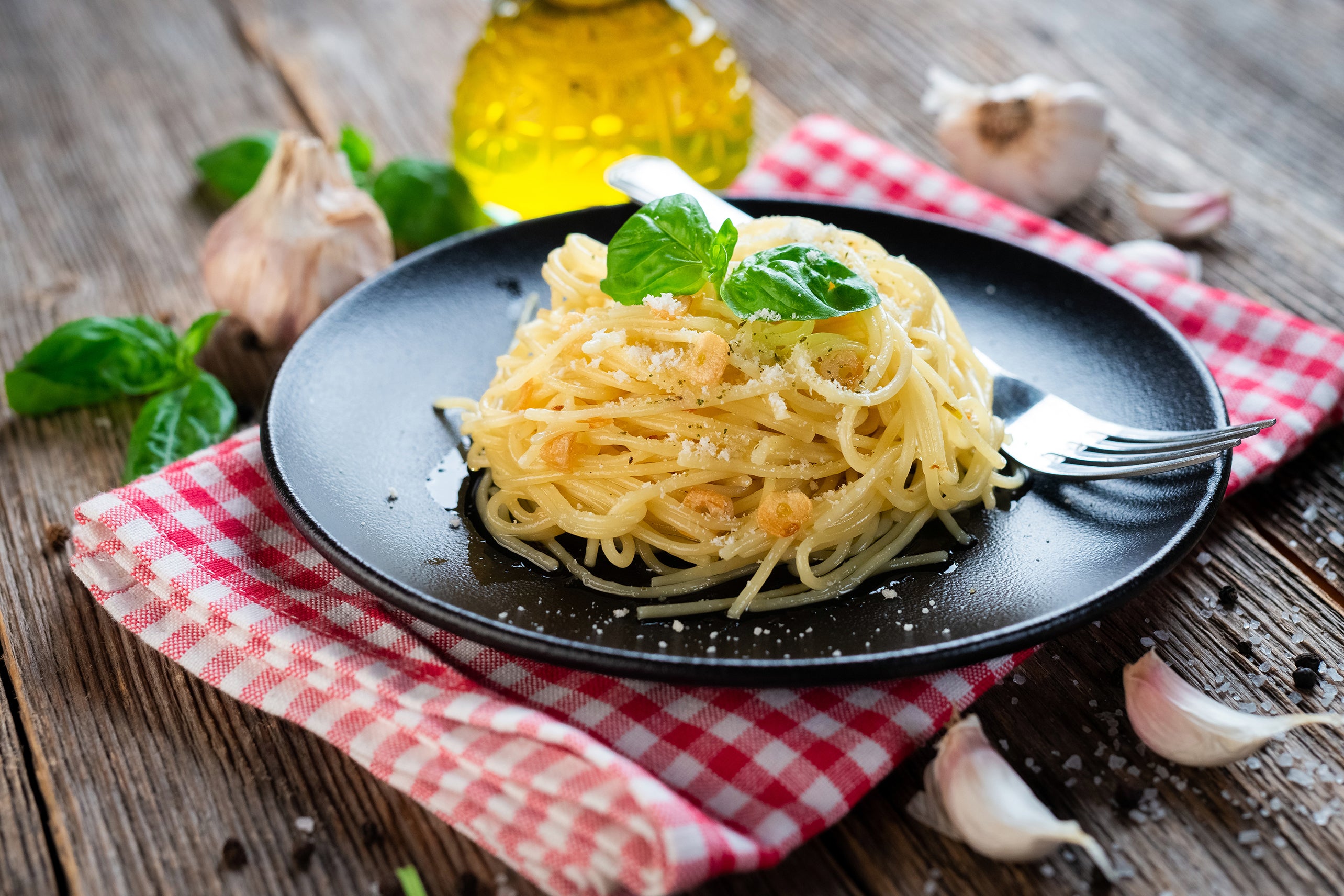 Spaghetti with garlic and oil is a classic Italian pasta dish made with spaghetti, garlic, olive oil, and red pepper flakes.