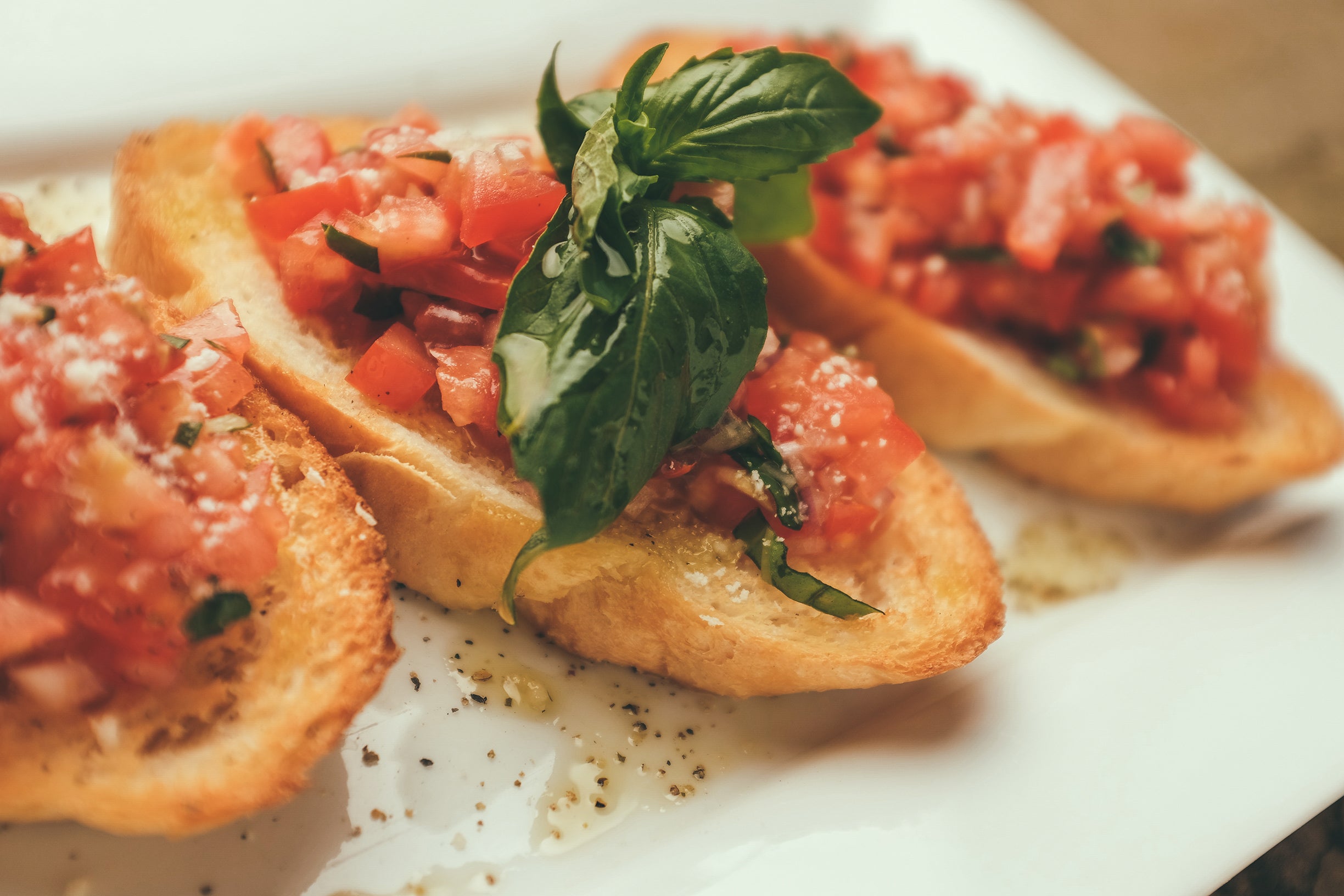 Italian Bruschetta is a simple and flavorful appetizer made with toasted bread, fresh tomatoes, garlic, and olive oil.