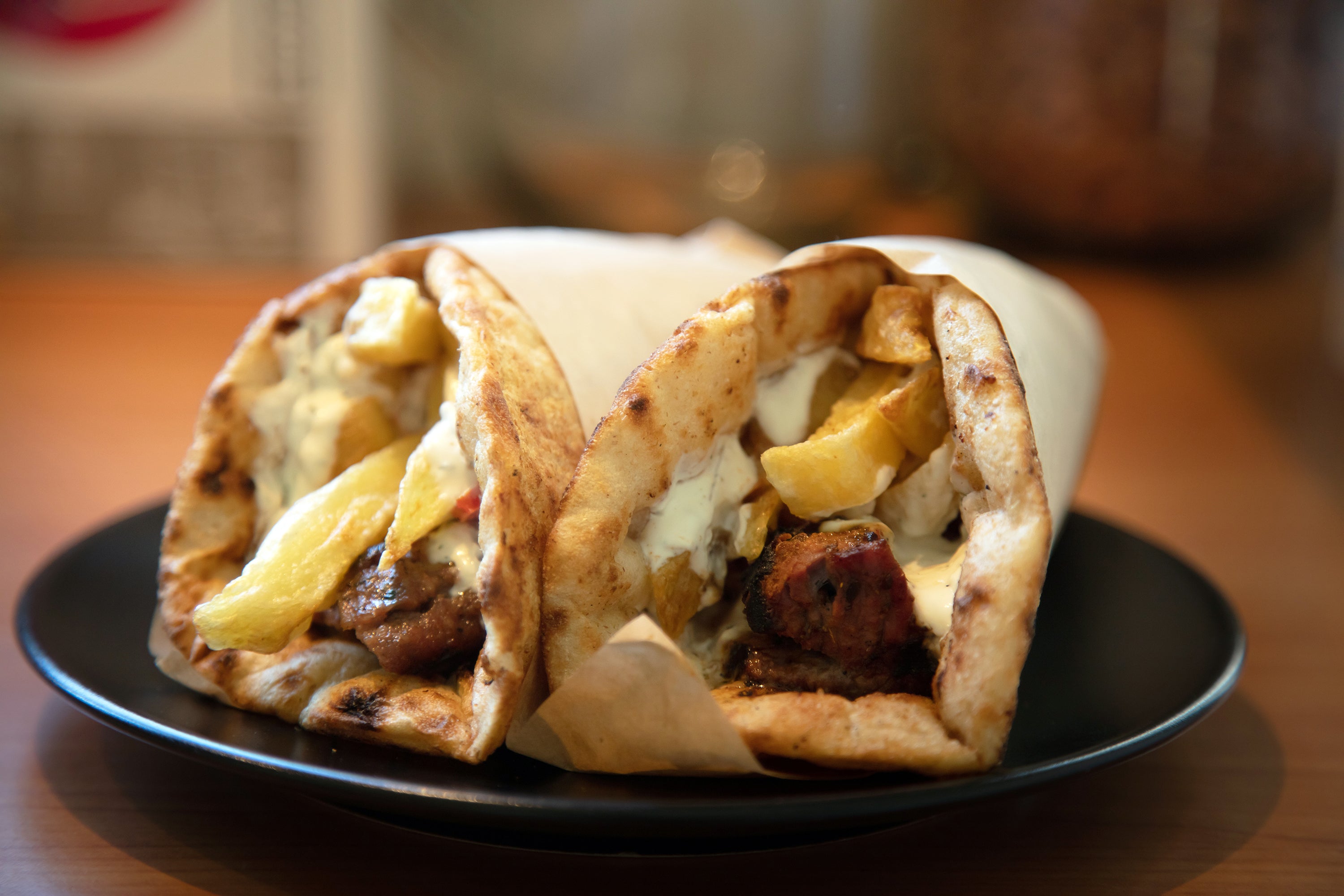 Chicken Shawarma Wrap is a flavorful and filling wrap made with seasoned chicken, fresh vegetables, and a tangy sauce. 