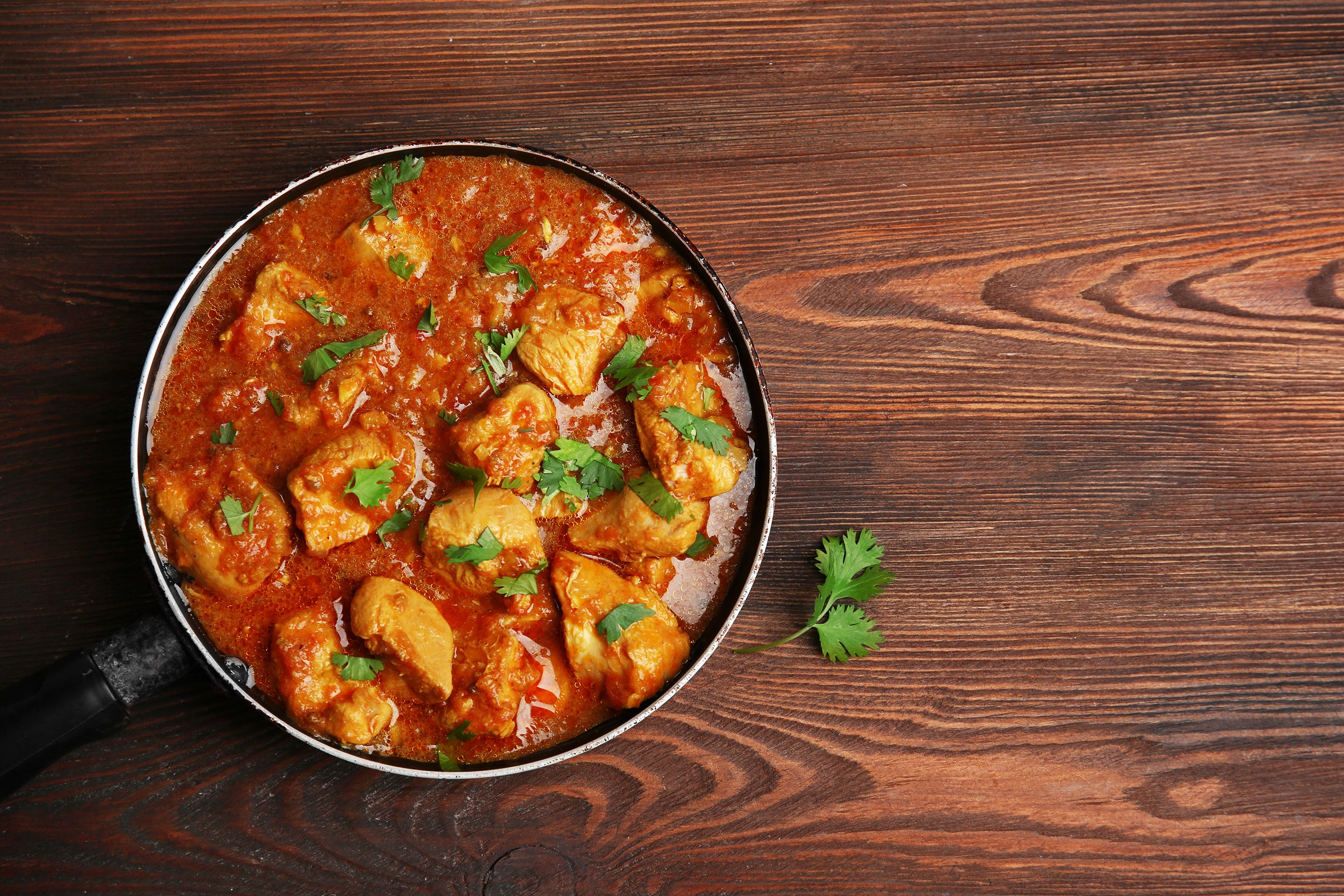 Indian Curry is made with a variety of spices, including turmeric, cumin, and coriander.