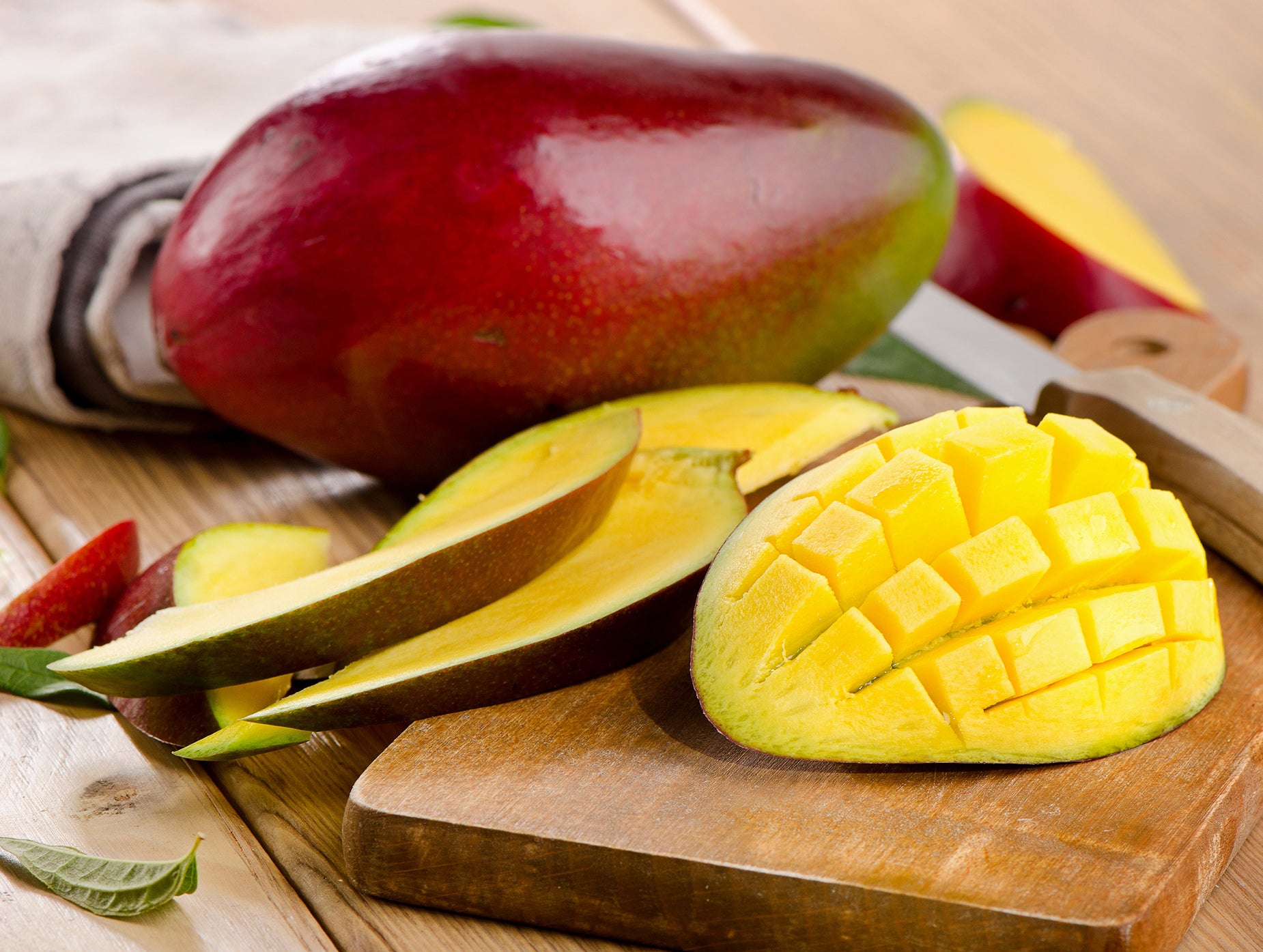 Sliced fresh mangos used in baby food puree.